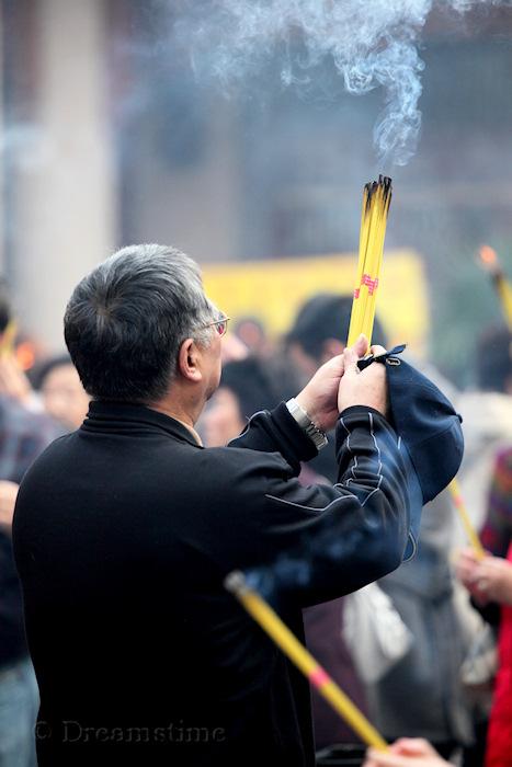 Buddhism , incense, people